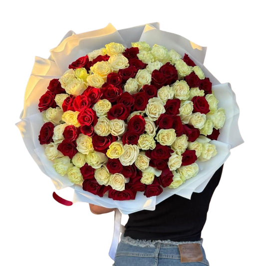 White and Red roses Wrapped bouquet .