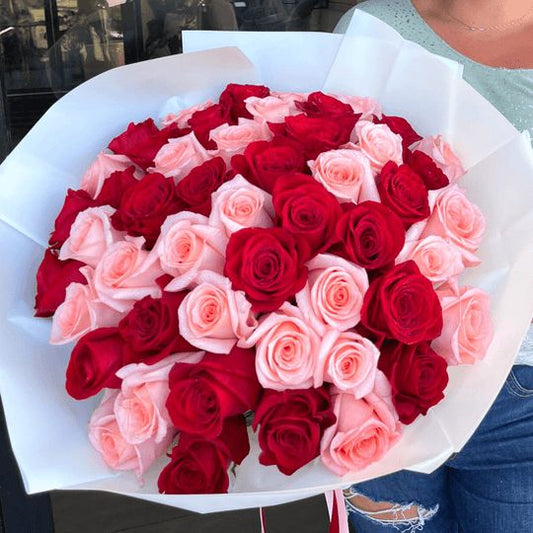 A bouquet of pink and red roses 