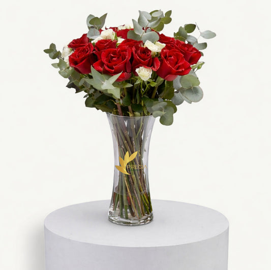 Red  and white baby Roses In Vase .