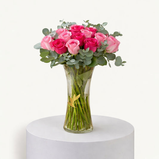 Dark and light Pink Roses In Vase .